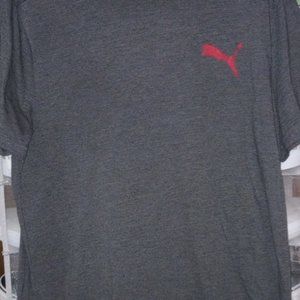 Puma T-shirt for sale. Size large. Soft and comfy material. Never been worn.